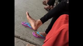 YOUNG LADY NON STOP FOOT DANGLING